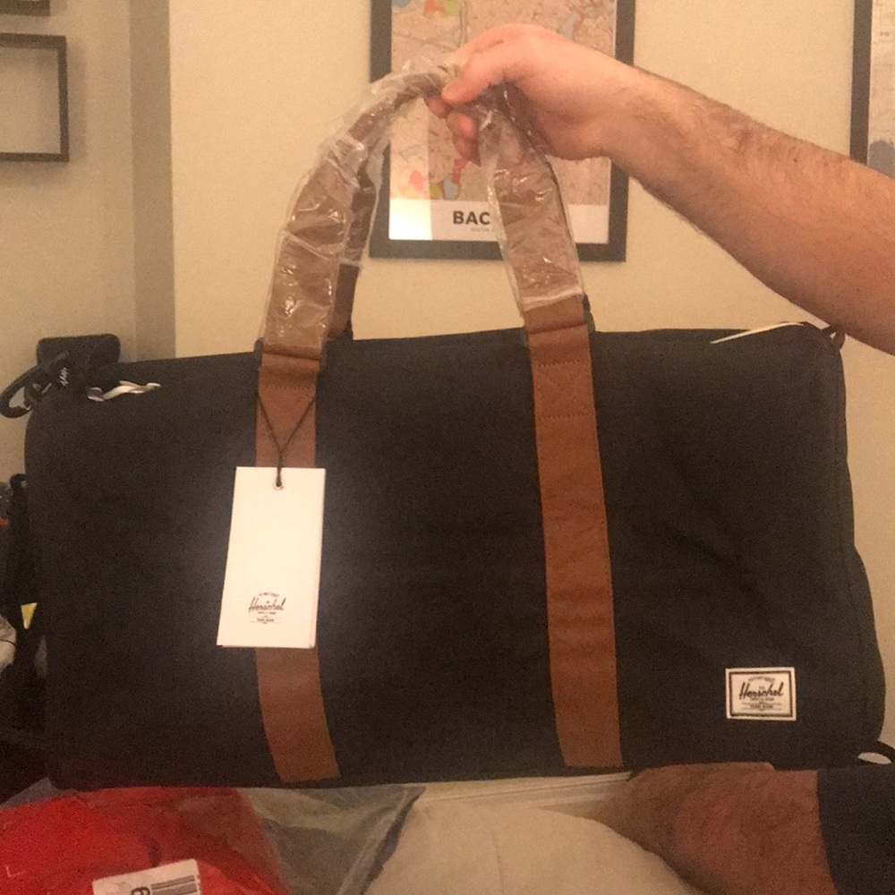 A brand new with tags on Hershel men’s duffle bag